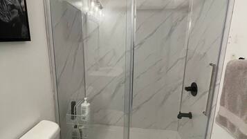 Hair dryer, towels, soap, shampoo