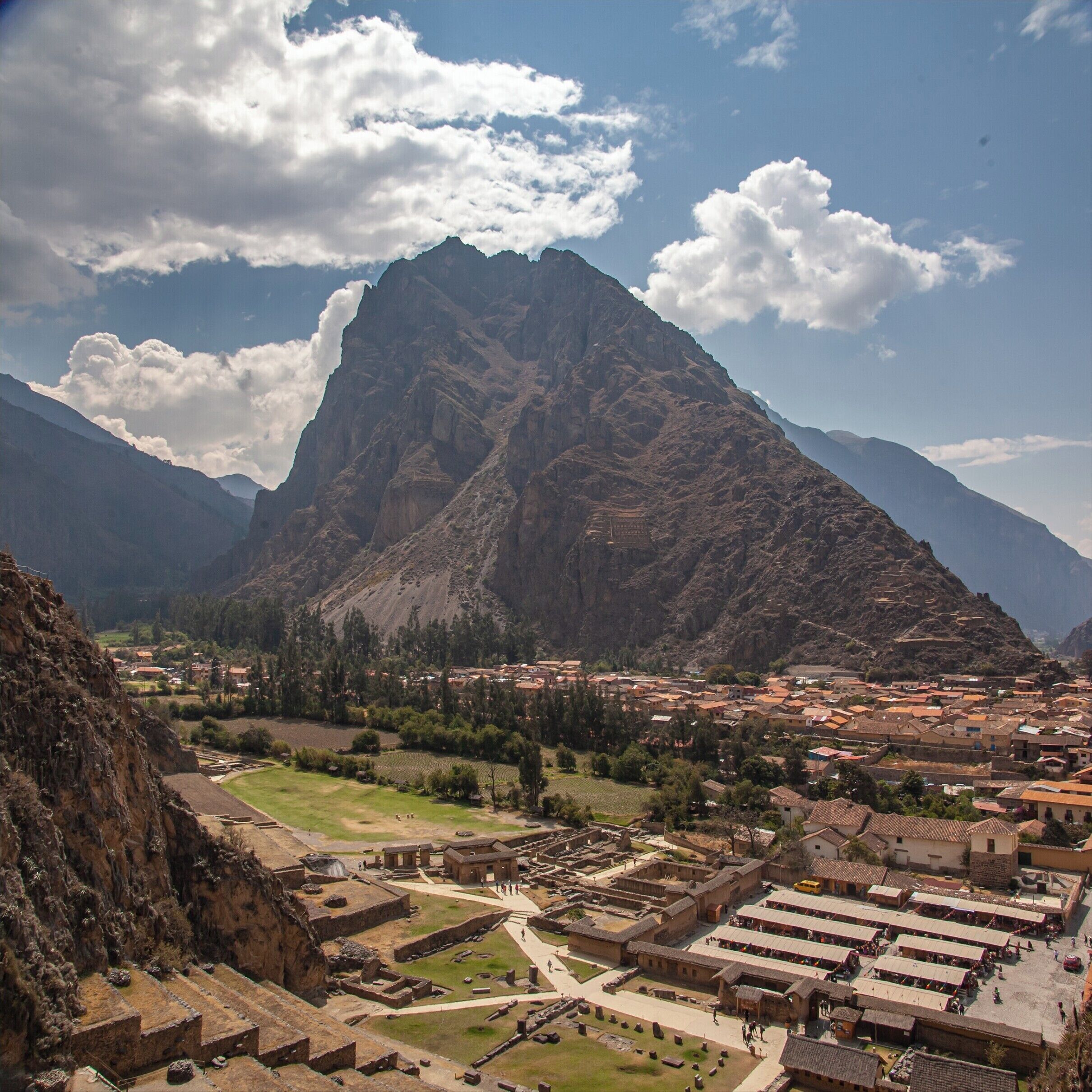 A mountainous landscape with a town nestled in the valley.