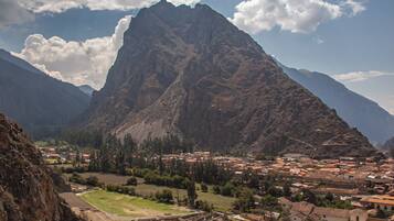 A mountainous landscape with a town nestled in the valley.
