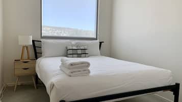 2 habitaciones, tabla de planchar con plancha, cuna de viaje y wifi