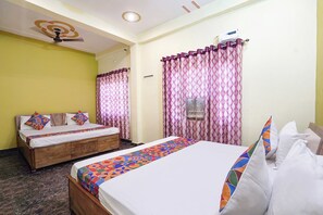 Family Room | Egyptian cotton sheets, premium bedding, in-room safe, free WiFi - Fabhotel Radhika Palace (Faizabad)