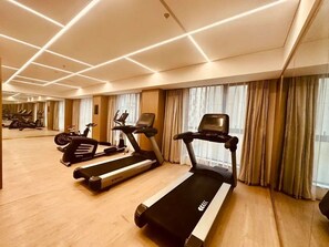 Work out in style with our fully equipped gym featuring treadmills and stationary bikes.