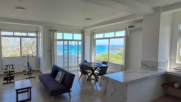 Family Apartment, Balcony, Beach View | Living area - Cabañas Don Jorge (Puerto Baquerizo Moreno)
