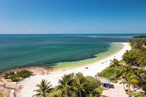 Enjoy a serene beach vacation with a clear ocean view and access to a sandy shoreline.