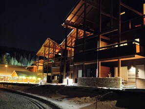 A multi-story building with a wooden facade and a balcony area. - Levin laf by Interhome (Kittilä)