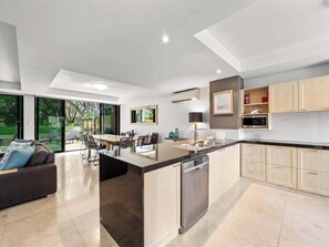 Coffee/tea maker, fridge, microwave, oven