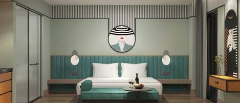 A modern bedroom with a teal-colored headboard, a bed with white bedding, two bedside tables with lamps, and a small round table with a bottle and glasses.