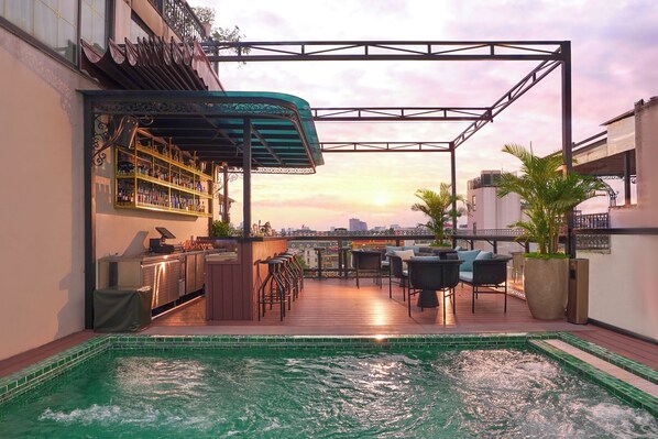 Outdoor pool, open 8:00 AM to 8:30 PM, pool umbrellas, pool loungers