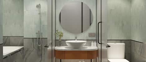 A modern bathroom with a glass-enclosed shower, a marble sink, and a toilet.