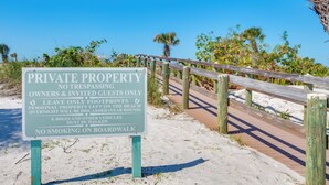 A sign indicating private property with no trespassing, only owners and invited guests allowed. - Little Gasparilla Island Escape on Private Island! (Placida)
