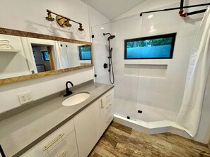 Shower, hair dryer, towels, soap