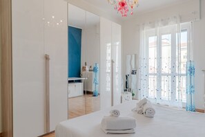 1 bedroom, desk, iron/ironing board, bed sheets