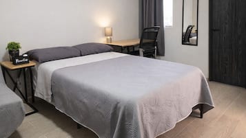 Studio Suite Kota | Meja kerja, Wi-Fi gratis, dan seprai linen