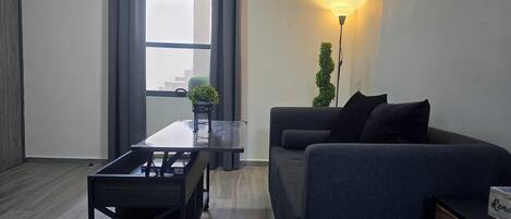 Comfort Double Room | Living area | 50-inch Smart TV with digital channels