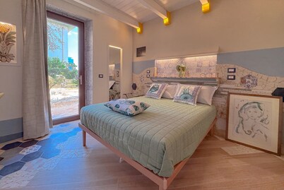 Il Cielo in Una Stanza is a stylish ground floor apartment within Villa Antolina Apartments in San Benedetto del Tronto. Just 5 minutes from the beach, it features 2 double bedrooms, spacious living with kitchen, fireplace and bar, WiFi, smart TVs in all