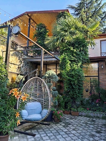 Terrace/patio. Hotel and Restaurant VILLA GIVISI