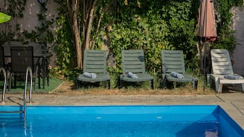 Seasonal outdoor pool, open 9:00 AM to 7:30 PM, sun loungers
