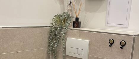 Hair dryer, towels, soap, toilet paper