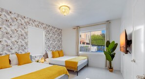 2 bedrooms, desk, iron/ironing board, travel crib