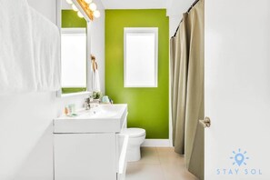 Shower, hair dryer, towels