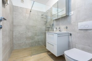 Dutxa, assecador de cabells i tovalloles 