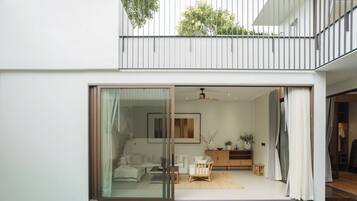 Villa Luxe, vue piscine | Coin séjour