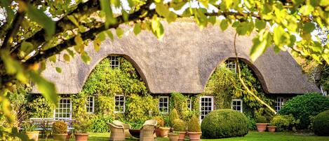 Superior cottage, uitzicht op tuin (La chaumière) | Uitzicht vanuit de kamer
