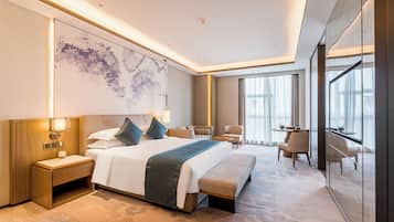Premier Room | 1 bedroom, down comforters, in-room safe, blackout drapes