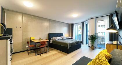 Bonquartier | Design apartment with balcony, parking space + charging station