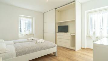 2 dormitorios, tabla de planchar con plancha, wifi gratis y ropa de cama