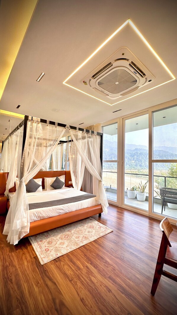 Premier suite, 1 tweepersoonsbed, uitzicht op rivier | Gratis wifi, beddengoed