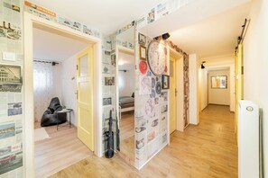 Classic Apartment, Patio | Living area | Flat-screen TV