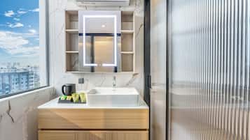 Superior Double Room, City View | Bathroom | Shower, free toiletries, hair dryer, slippers