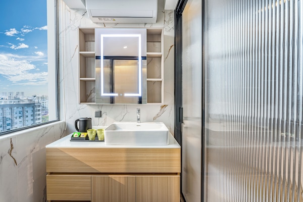 Superior Double Room, City View | Bathroom | Shower, free toiletries, hair dryer, slippers