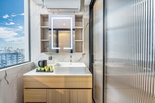 Superior Double Room, City View | Bathroom | Shower, free toiletries, hair dryer, slippers