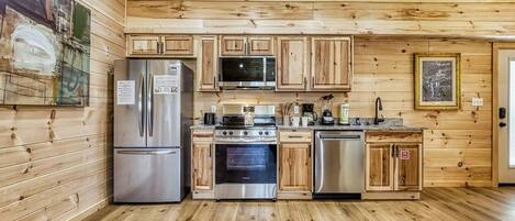 Réfrigérateur, micro-ondes, lave-vaisselle, cafetiÚre/bouilloire