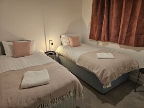 3 slaapkamers, een strijkplank/strijkijzer, gratis wifi