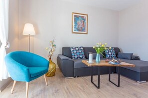 Apartment, Balcony, Partial Sea View | Living area | 32-inch flat-screen TV with cable channels