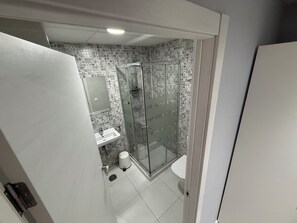 Shower, towels, soap, shampoo