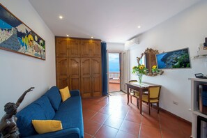 Suite Superior, pemandangan laut | Brankas, tirai kedap cahaya, dan Wi-Fi gratis