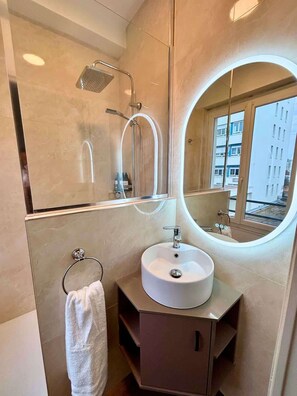 Shower, hair dryer, shampoo