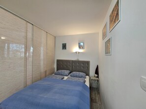 Desk, iron/ironing board, travel cot, free WiFi