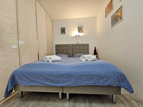 Desk, iron/ironing board, travel crib, free WiFi