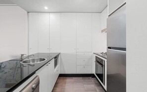 Coffee/tea maker, fridge, microwave, oven