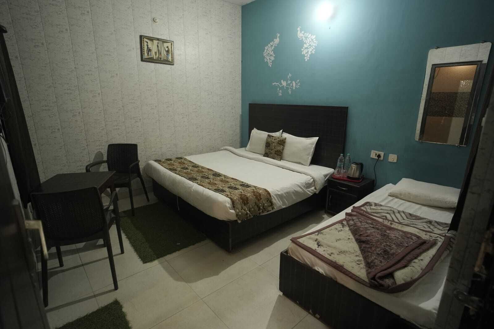 Chambre Triple Deluxe