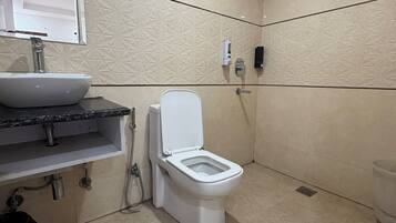 Combined shower/tub, slippers, towels, soap