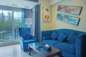 Deluxe Suite | Living area | 32-inch LCD TV with satellite channels - Basilica Resort - Where Luxury Redefines (Panchgani)