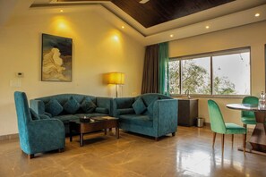 Royal Villa | Living area | 32-inch LCD TV with satellite channels - Basilica Resort - Where Luxury Redefines (Panchgani)