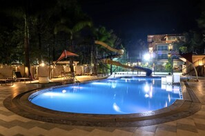 Outdoor pool, pool loungers - Basilica Resort - Where Luxury Redefines (Panchgani)