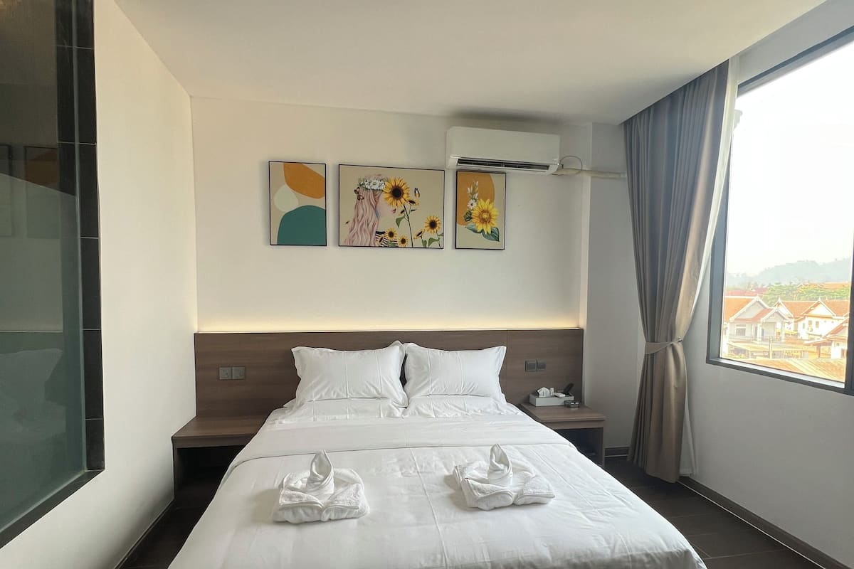 Basic Single Room | Premium bedding, down comforters, desk, blackout drapes